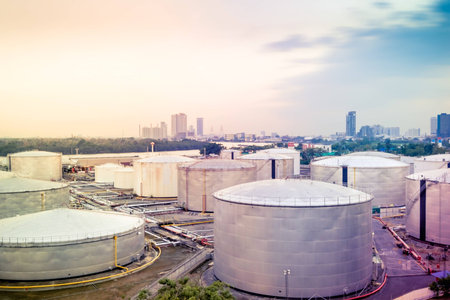 Petroleum from Medieval Latin petroleum, from Latin: petra: "rock"  oleum: "oil" is a naturally occurring, yellow-to-black liquid found in geological formations beneath the Earth's surface, which is commonly refined into various types of fuels.の写真素材