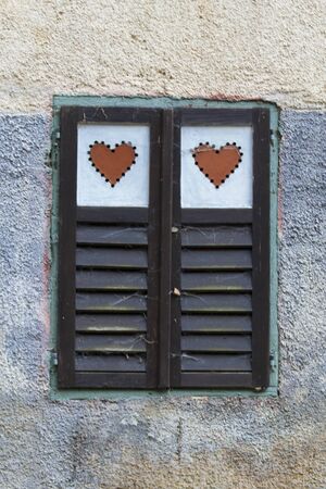 Cute historical window with heart ornamentの写真素材