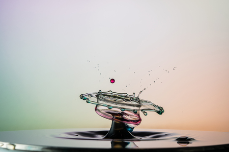 water drop collision on a wet backgroundの写真素材