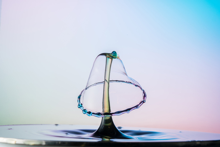 water drop collision on a wet backgroundの写真素材