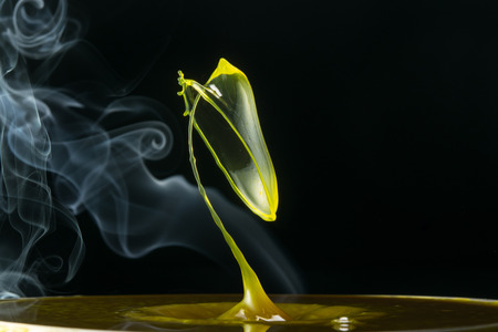 water drop collision on a wet backgroundの写真素材