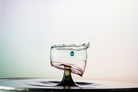 water drop collision on a background wetの写真素材