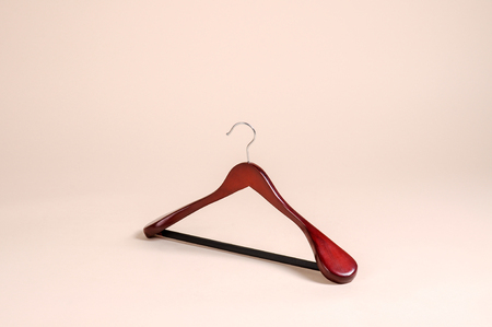 A close up shot of wooden clothes hangerの写真素材
