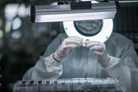 The quality inspector is checking the itemのeditorial素材