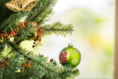 Christmas tree and decorations in the backgroundの写真素材