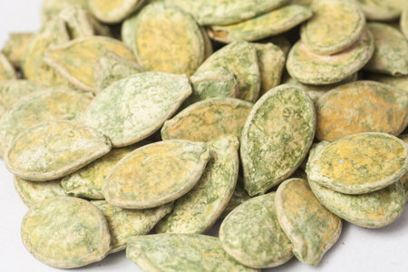 Pumpkin seeds isolated on white background