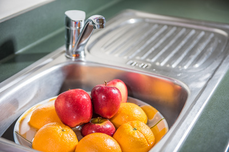 Washing fruitsの写真素材