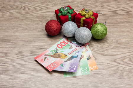 Christmas decorations and New Zealand Dollarの写真素材