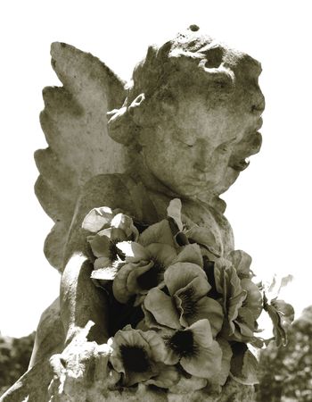 Weathered Angel with Cloth Flowersの写真素材