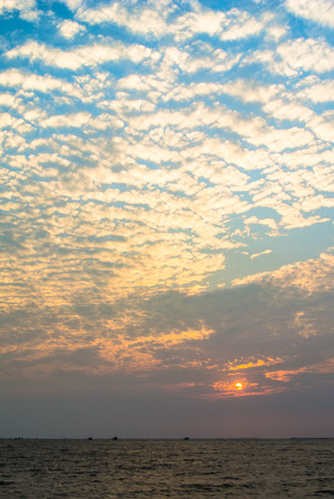 Sea and cloudscape on sunset の写真素材