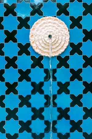 Moroccan fountain with mosaic tiles の写真素材