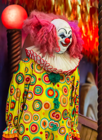 Scary clown robot in clown mask.の写真素材