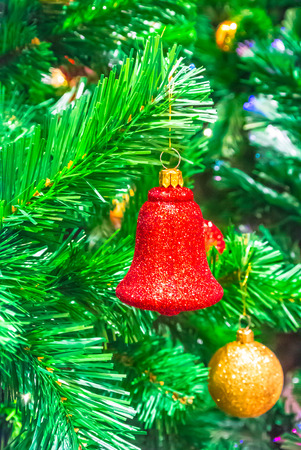Close-up of Christmas ornaments on a Christmas tree.の写真素材