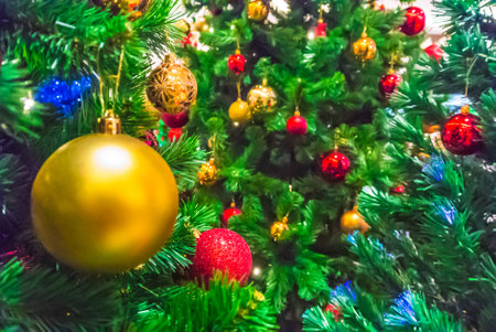 Christmas ornaments on the Christmas tree Background.の写真素材
