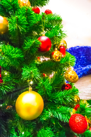 Close-up of Christmas ornaments on a Christmas tree.の写真素材