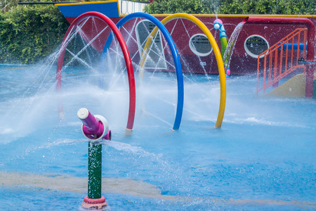 Colorful waterpark tubes and pool in tropical aquapark.のeditorial素材