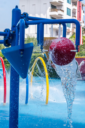 Colorful waterpark tubes and pool in tropical aquapark.のeditorial素材