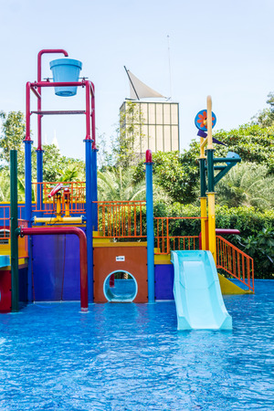 Colorful waterpark tubes and pool in tropical aquapark.のeditorial素材