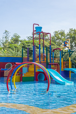 Colorful waterpark tubes and pool in tropical aquapark.のeditorial素材