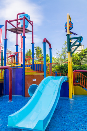 Colorful waterpark tubes and pool in tropical aquapark.のeditorial素材