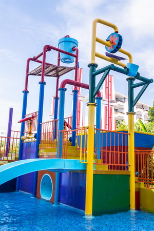 Colorful waterpark tubes and pool in tropical aquapark.のeditorial素材