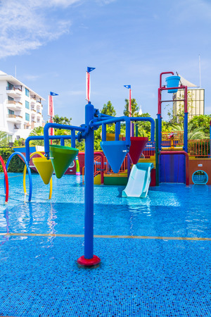 Colorful waterpark tubes and pool in tropical aquapark.のeditorial素材