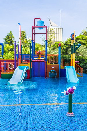 Colorful waterpark tubes and pool in tropical aquapark.のeditorial素材