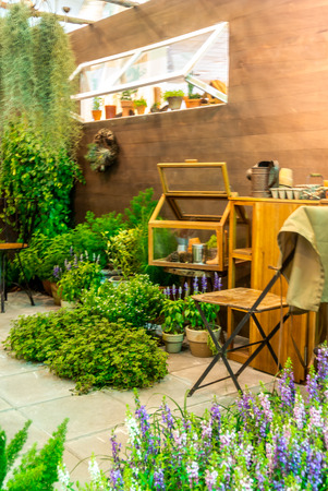 Gardening tools and cabinet in relax garden.の写真素材