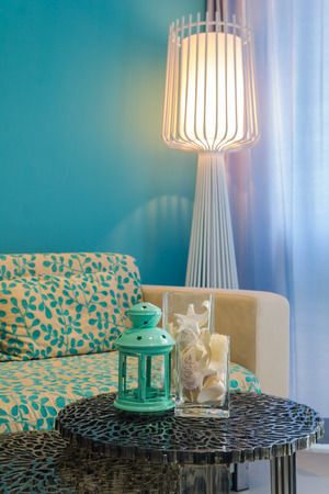 Interior of stylish sofabed with cushions in a modern livingroom.の写真素材