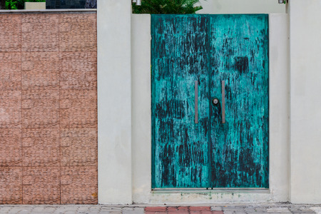 Front entrance to a residential home with a copper door.の写真素材