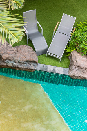 Top view relaxing poolside swimming pool chair.の写真素材