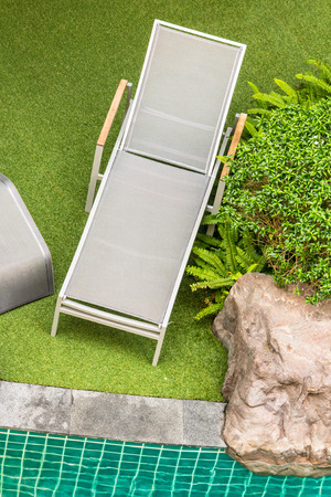 Top view relaxing poolside swimming pool chair.の写真素材
