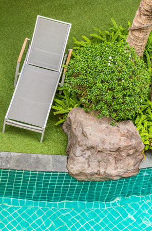 Top view relaxing poolside swimming pool chair.の写真素材