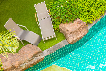 Top view relaxing poolside swimming pool chair.の写真素材