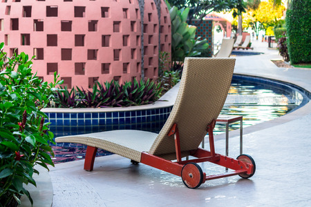 Relaxing Tanning bed beside swimming pool.の写真素材