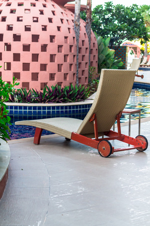 Relaxing Tanning bed beside swimming pool.の写真素材