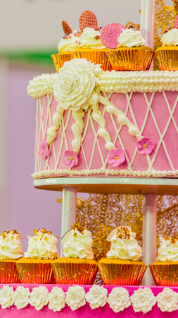 Sweet beauty flower and topping pastel color on wedding cake decoration.の写真素材