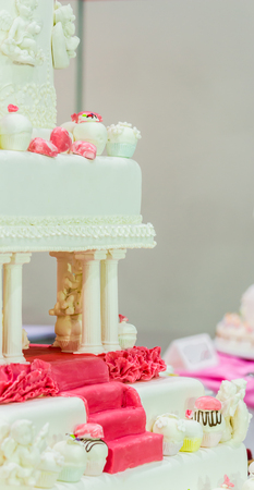 Sweet beauty flower and topping pastel color on wedding cake decoration.の写真素材