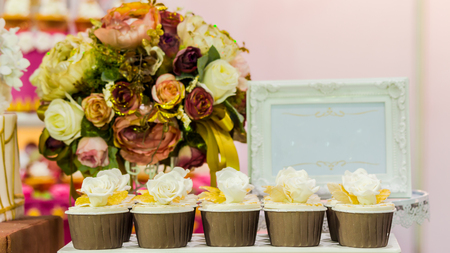 Sweet beauty flower and topping pastel color on weddinng cake decoration.の写真素材