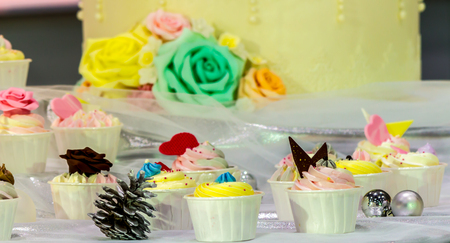 Sweet beauty flower and topping pastel color on weddinng cake decoration.の写真素材