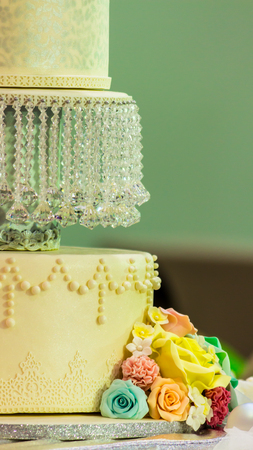 Sweet beauty flower and topping pastel color on weddinng cake decoration.の写真素材