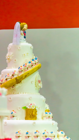 Sweet beauty flower and topping pastel color on weddinng cake decoration.の写真素材