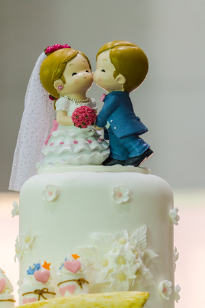 Sweet beauty flower and topping pastel color on weddinng cake decoration.の写真素材