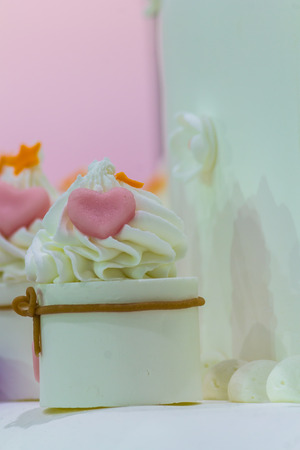 Sweet beauty flower and topping pastel color on weddinng cake decoration.の写真素材