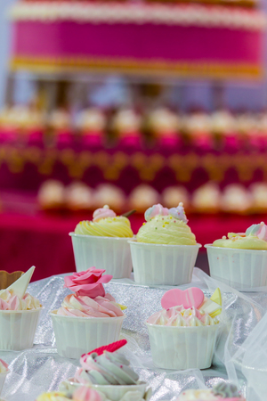 Sweet beauty flower and topping pastel color on weddinng cake decoration.の写真素材
