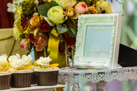 Sweet beauty flower and topping pastel color on weddinng cake decoration.の写真素材