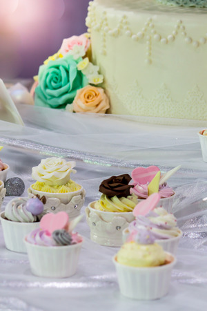 Sweet beauty flower and topping pastel color on weddinng cake decoration.の写真素材