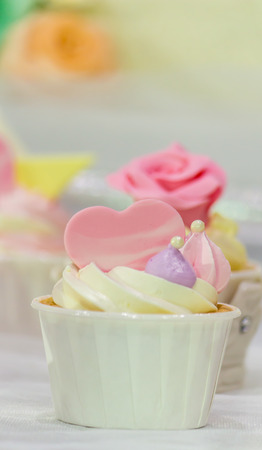 Cupcakes on tier at wedding reception.の写真素材
