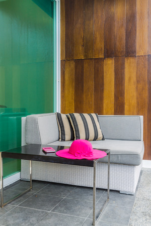 Pool access cozy modern bedroom decoration with soft seats and cushions.の写真素材