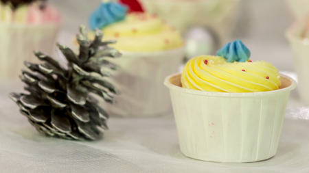 Cupcakes on tier at wedding reception.の写真素材